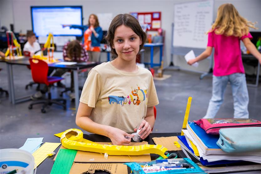 Students build paper rollercoasters